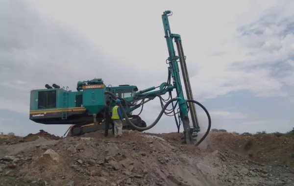 Integrated-DTH-Blasting-Drill-Rig-new-600x380